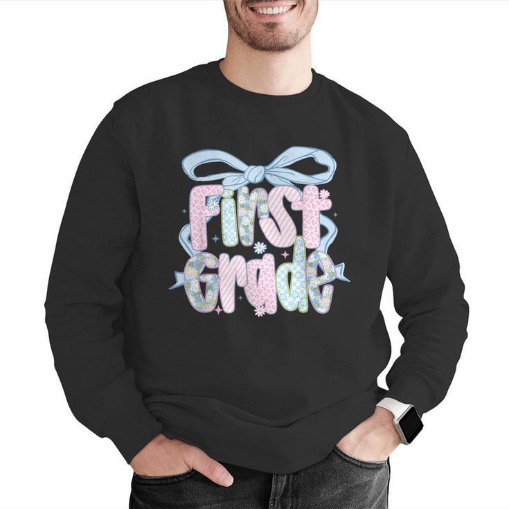 First Grade Coquette Bow Girls Teacher Team 1st Grade Squad Men Graphic Sweatshirt, First Grade Teacher Sweatshirts, funny gift First Grade Coquette Bow Girls Teacher Team 1st Grade Squad Men Graphic Sweatshirt, First Grade Teacher Sweatshirts, funny gift