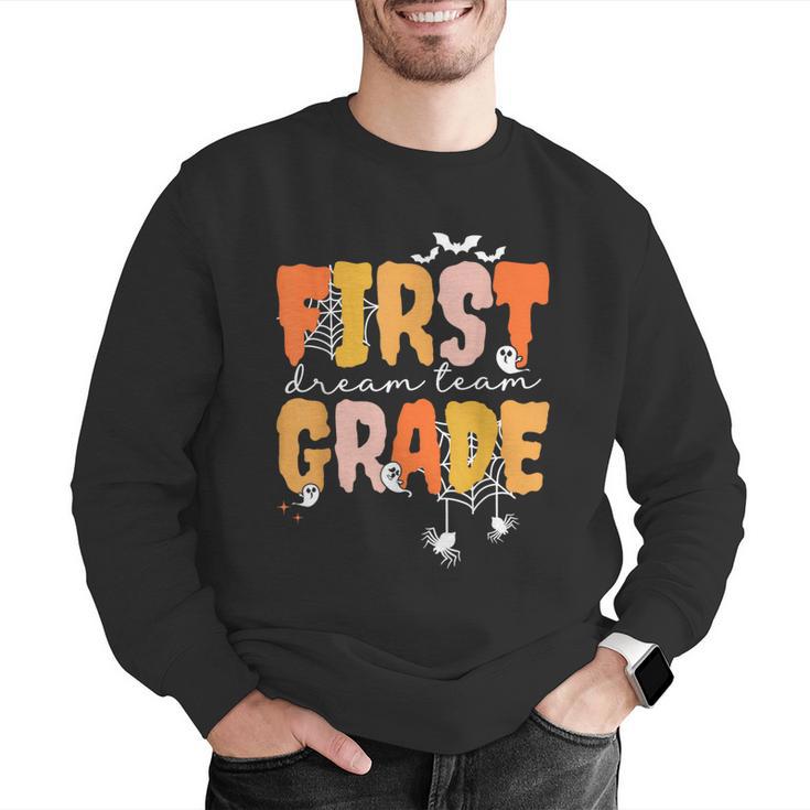 First Grade Dream Retro Team Fall Halloween Spooky Teachers Men Graphic Sweatshirt, First Grade Teacher Sweatshirts, funny gift
