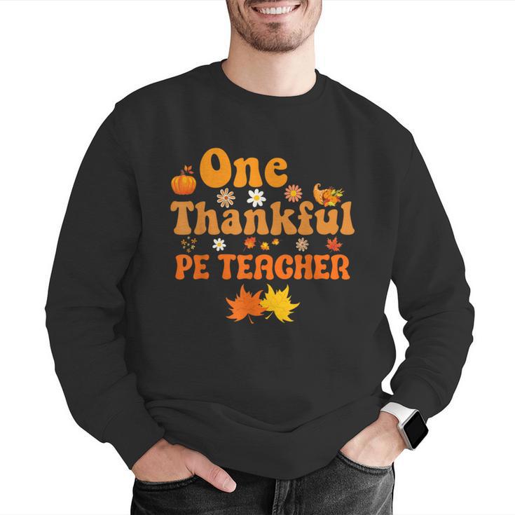 One Thankful PE Teacher Thanksgiving Fall Autumn Groovy Men Graphic Sweatshirt, Pe Teacher Sweatshirts, Groovy Teacher Sweatshirts, funny gift One Thankful PE Teacher Thanksgiving Fall Autumn Groovy Men Graphic Sweatshirt, Pe Teacher Sweatshirts, Groovy Teacher Sweatshirts, funny gift