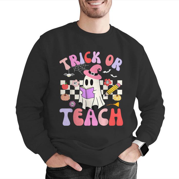 Trick Or Teach Halloween Teacher Floral Ghost Groovy Men Graphic Sweatshirt, Groovy Teacher Sweatshirts, funny gift Trick Or Teach Halloween Teacher Floral Ghost Groovy Men Graphic Sweatshirt, Groovy Teacher Sweatshirts, funny gift