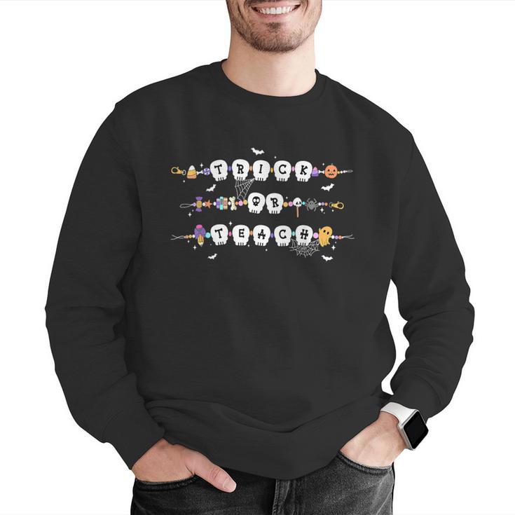 Trick Or Teach Spooky Teacher Happy Halloween Bracelet Men Graphic Sweatshirt, funny gift Trick Or Teach Spooky Teacher Happy Halloween Bracelet Men Graphic Sweatshirt, funny gift