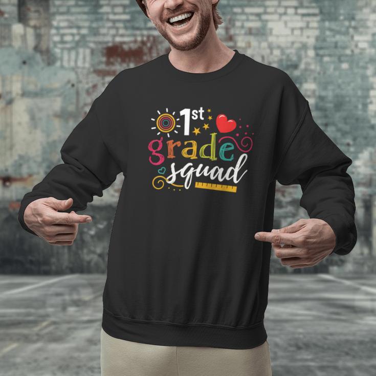 1st First Grade Squad Student Teacher Back To School Men Graphic Sweatshirt, First Grade Teacher Sweatshirts, gift for family, gift for coworker 1st First Grade Squad Student Teacher Back To School Men Graphic Sweatshirt, First Grade Teacher Sweatshirts, gift for family, gift for coworker