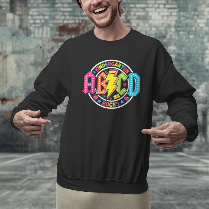 ABCD Kindergarten Rocks Back To School Teachers Students Men Graphic Sweatshirt, gift for family, gift for coworker ABCD Kindergarten Rocks Back To School Teachers Students Men Graphic Sweatshirt, gift for family, gift for coworker
