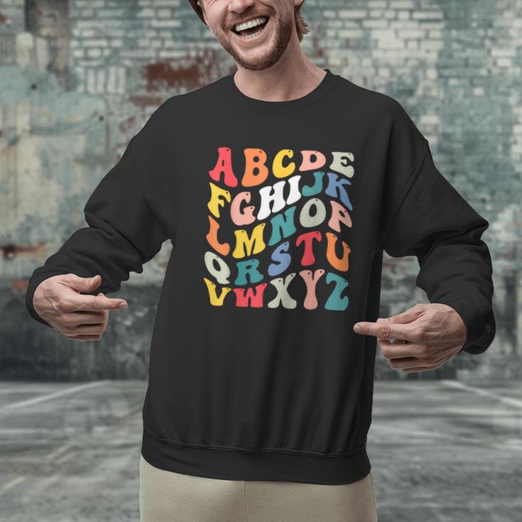Alphabet Hi Back To School ABC Pre K Kindergarten Teacher Men Graphic Sweatshirt, gift for family, gift for coworker Alphabet Hi Back To School ABC Pre K Kindergarten Teacher Men Graphic Sweatshirt, gift for family, gift for coworker