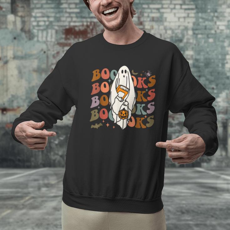 Booooks Ghost Halloween Groovy Vintage Teacher Book Reading Men Graphic Sweatshirt, Groovy Teacher Sweatshirts, gift for family, gift for coworker