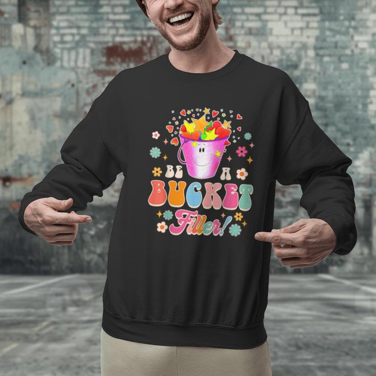 Be A Bucket Filler Teacher Teaching Groovy Back To School For Men Women Men Graphic Sweatshirt, Groovy Teacher Sweatshirts, gift for family, gift for coworker