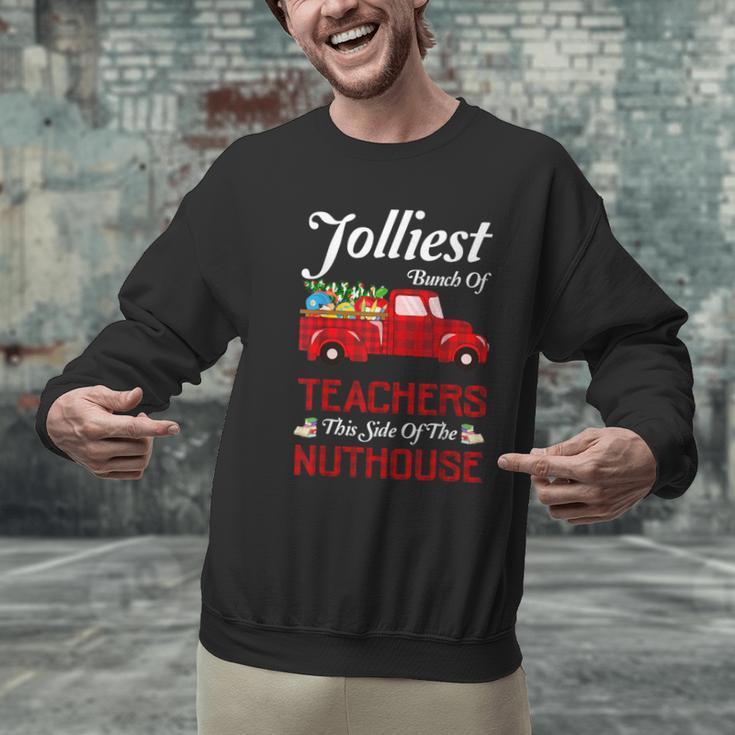 Bunch Of Teachers This Side Of The Nuthouse Xmas Men Graphic Sweatshirt, gift for family, gift for coworker Bunch Of Teachers This Side Of The Nuthouse Xmas Men Graphic Sweatshirt, gift for family, gift for coworker