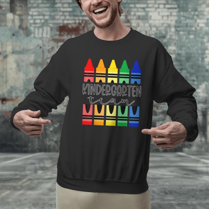 Colorful Crayon Kindergarten Team Tee For Teachers Students Men Women Kids Men Graphic Sweatshirt, gift for family, gift for coworker Colorful Crayon Kindergarten Team Tee For Teachers Students Men Women Kids Men Graphic Sweatshirt, gift for family, gift for coworker