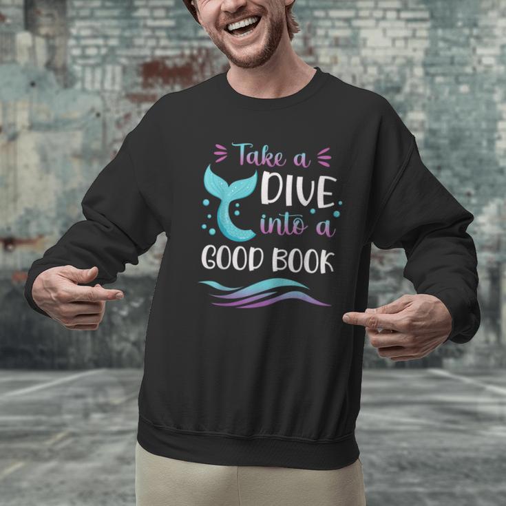 Cute Mermaid Librarian Teacher Dive Into A Good Book Reading Men Graphic Sweatshirt, gift for family, gift for coworker Cute Mermaid Librarian Teacher Dive Into A Good Book Reading Men Graphic Sweatshirt, gift for family, gift for coworker