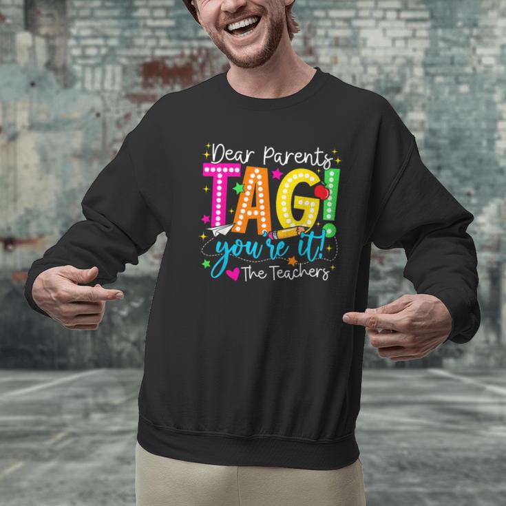 Dear Parents Tag You'Re It Love Teachers Last Day Of School Men Graphic Sweatshirt, gift for family, gift for coworker Dear Parents Tag You'Re It Love Teachers Last Day Of School Men Graphic Sweatshirt, gift for family, gift for coworker