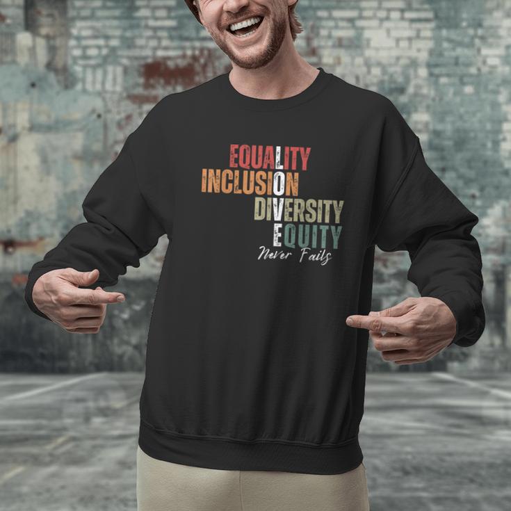 Equality Inclusion Diversity Equity Love Never Fails Teacher Men Graphic Sweatshirt, gift for family, gift for coworker Equality Inclusion Diversity Equity Love Never Fails Teacher Men Graphic Sweatshirt, gift for family, gift for coworker