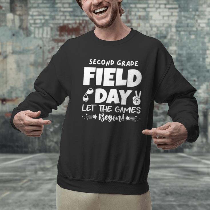 Field Day Second 2nd Grade Orange 2025 Boy Girl Teacher Men Graphic Sweatshirt, 2nd Grade Teacher Sweatshirts, gift for family, gift for coworker Field Day Second 2nd Grade Orange 2025 Boy Girl Teacher Men Graphic Sweatshirt, 2nd Grade Teacher Sweatshirts, gift for family, gift for coworker