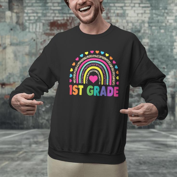 First Grade Rainbow Girls Boys Teacher Team 1st Grade Squad Men Graphic Sweatshirt, First Grade Teacher Sweatshirts, gift for family, gift for coworker First Grade Rainbow Girls Boys Teacher Team 1st Grade Squad Men Graphic Sweatshirt, First Grade Teacher Sweatshirts, gift for family, gift for coworker