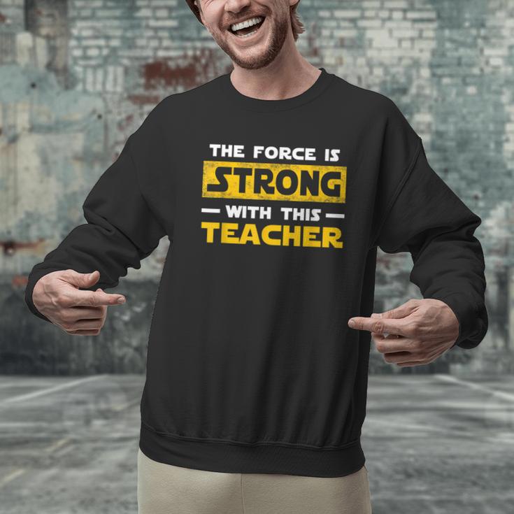 The Force Strong With This Teacher Men Women Kids Men Graphic Sweatshirt, gift for family, gift for coworker The Force Strong With This Teacher Men Women Kids Men Graphic Sweatshirt, gift for family, gift for coworker