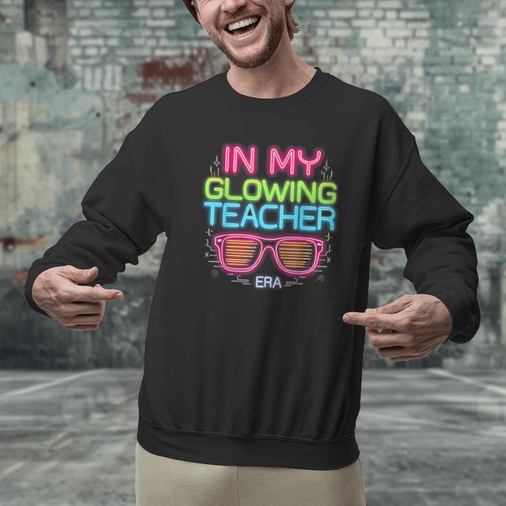 In My Glowing Teacher Era Groovy Colorful Bright Men Graphic Sweatshirt, Groovy Teacher Sweatshirts, gift for family, gift for coworker In My Glowing Teacher Era Groovy Colorful Bright Men Graphic Sweatshirt, Groovy Teacher Sweatshirts, gift for family, gift for coworker