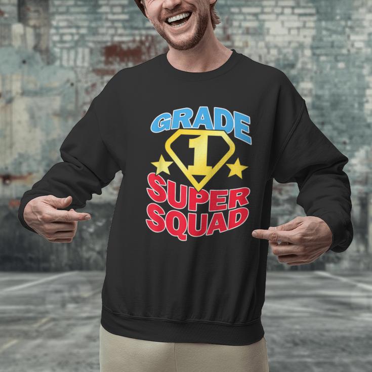 Grade 1 Super Squad Superhero Teacher Team Men Graphic Sweatshirt, Super Teacher Sweatshirts, gift for family, gift for coworker Grade 1 Super Squad Superhero Teacher Team Men Graphic Sweatshirt, Super Teacher Sweatshirts, gift for family, gift for coworker