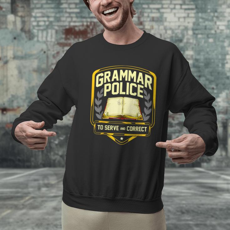 Grammar Police To Serve And Correct English Teacher Men Graphic Sweatshirt, English Teacher Sweatshirts, gift for family, gift for coworker Grammar Police To Serve And Correct English Teacher Men Graphic Sweatshirt, English Teacher Sweatshirts, gift for family, gift for coworker