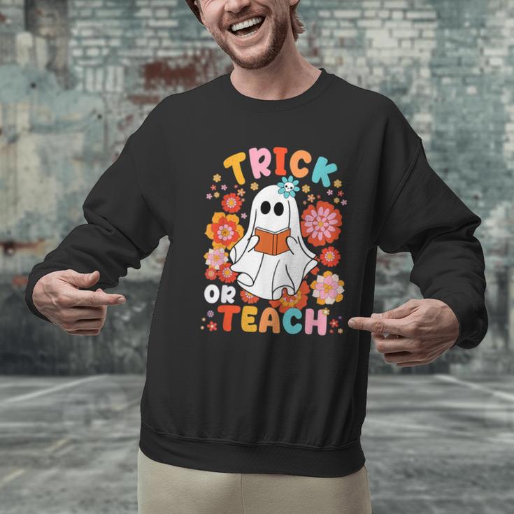 Groovy Halloween Trick Or Teach Retro Floral Ghost Teacher For Men Women Kids Men Graphic Sweatshirt, Groovy Teacher Sweatshirts, gift for family, gift for coworker