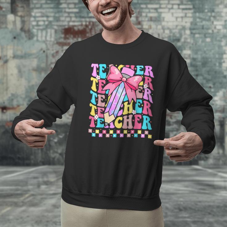 Groovy Teacher Cute Coquette Bow Flower Retro Back To School Men Graphic Sweatshirt, Groovy Teacher Sweatshirts, gift for family, gift for coworker