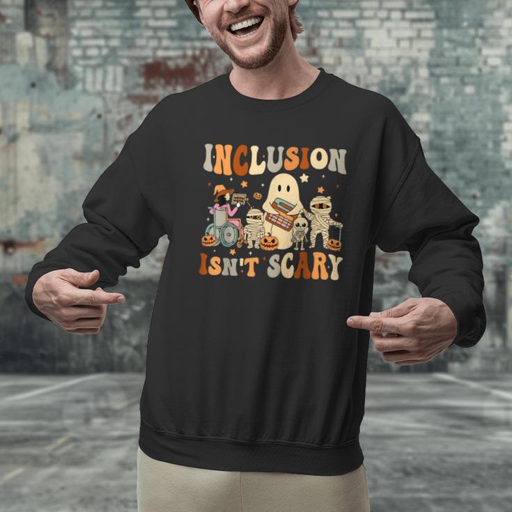Halloween SLP Sped Teacher Groovy Inclusion Isn't Scary Men Graphic Sweatshirt, Groovy Teacher Sweatshirts, gift for family, gift for coworker Halloween SLP Sped Teacher Groovy Inclusion Isn't Scary Men Graphic Sweatshirt, Groovy Teacher Sweatshirts, gift for family, gift for coworker