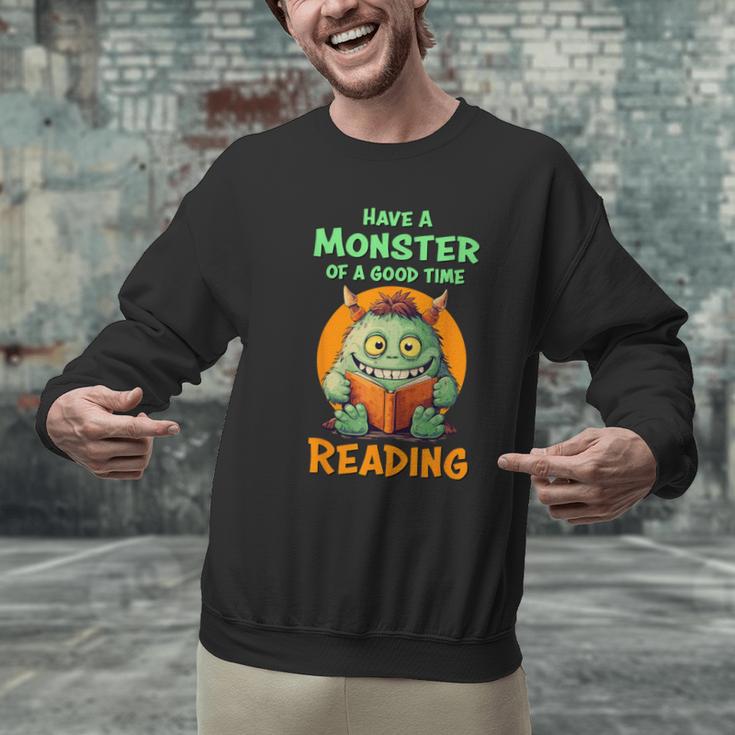 Halloween Teacher Librarian Monster Reading Books Men Women Kids Men Graphic Sweatshirt, gift for family, gift for coworker Halloween Teacher Librarian Monster Reading Books Men Women Kids Men Graphic Sweatshirt, gift for family, gift for coworker