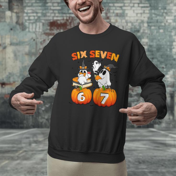 Haunted By 67 Boo Ghost Pumpkin Halloween Teacher Men Graphic Sweatshirt, gift for family, gift for coworker