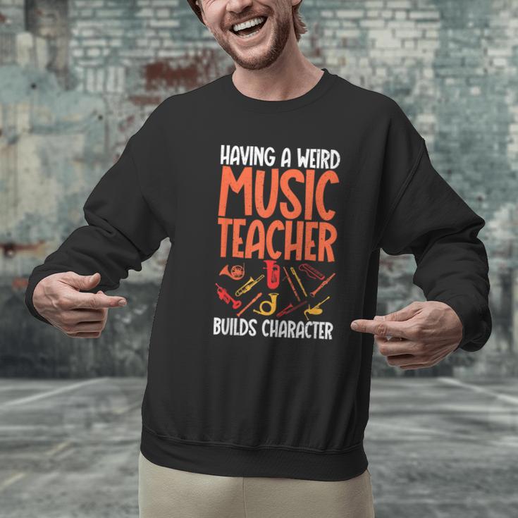 Having a Weird Music Teacher Builds Character Music Teacher Men Graphic Sweatshirt, gift for family, gift for coworker Having a Weird Music Teacher Builds Character Music Teacher Men Graphic Sweatshirt, gift for family, gift for coworker