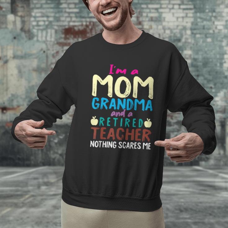 I'm Mom Grandma And A Retired Teacher Nothing Scares Me Men Women Men Graphic Sweatshirt, gift for family, gift for coworker I'm Mom Grandma And A Retired Teacher Nothing Scares Me Men Women Men Graphic Sweatshirt, gift for family, gift for coworker