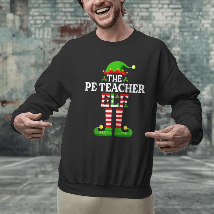 I'm The PE Teacher Elf Christmas Family Matching Men Graphic Sweatshirt, Pe Teacher Sweatshirts, gift for family, gift for coworker I'm The PE Teacher Elf Christmas Family Matching Men Graphic Sweatshirt, Pe Teacher Sweatshirts, gift for family, gift for coworker