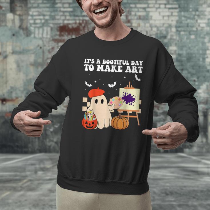 It's A Bootiful Day To Make Art Groovy Art Teacher Halloween Men Graphic Sweatshirt, Groovy Teacher Sweatshirts, gift for family, gift for coworker