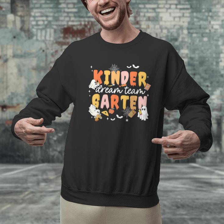 Kindergarten Dream Ghost Team Fall Halloween Spooky Teachers Men Graphic Sweatshirt, gift for family, gift for coworker Kindergarten Dream Ghost Team Fall Halloween Spooky Teachers Men Graphic Sweatshirt, gift for family, gift for coworker