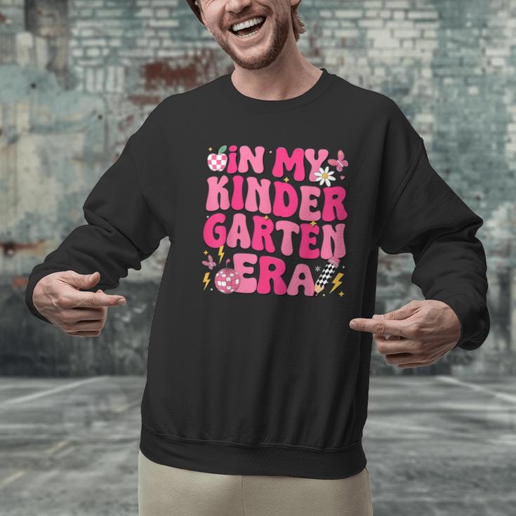 In My Kindergarten Era Girl Back To School Kinder Teacher Men Graphic Sweatshirt, gift for family, gift for coworker In My Kindergarten Era Girl Back To School Kinder Teacher Men Graphic Sweatshirt, gift for family, gift for coworker