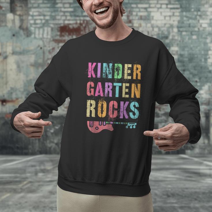 KINDERGARTEN ROCKS Teacher Crew Rock Star Kinder Team Men Graphic Sweatshirt, gift for family, gift for coworker KINDERGARTEN ROCKS Teacher Crew Rock Star Kinder Team Men Graphic Sweatshirt, gift for family, gift for coworker