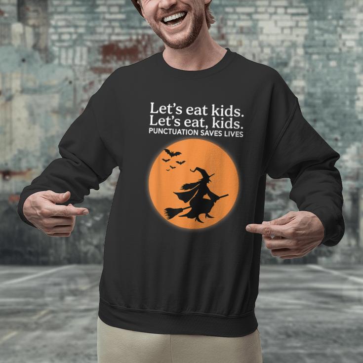 Let's Eat Kids Punctuation Saves Live Witch Grammar Teacher Men Graphic Sweatshirt, gift for family, gift for coworker Let's Eat Kids Punctuation Saves Live Witch Grammar Teacher Men Graphic Sweatshirt, gift for family, gift for coworker