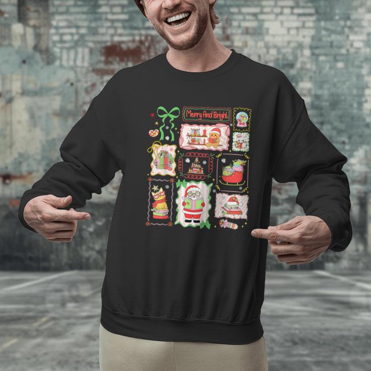 Merry And Bright Christmas Gingerbread Santa Book Teacher Men Graphic Sweatshirt, gift for family, gift for coworker Merry And Bright Christmas Gingerbread Santa Book Teacher Men Graphic Sweatshirt, gift for family, gift for coworker