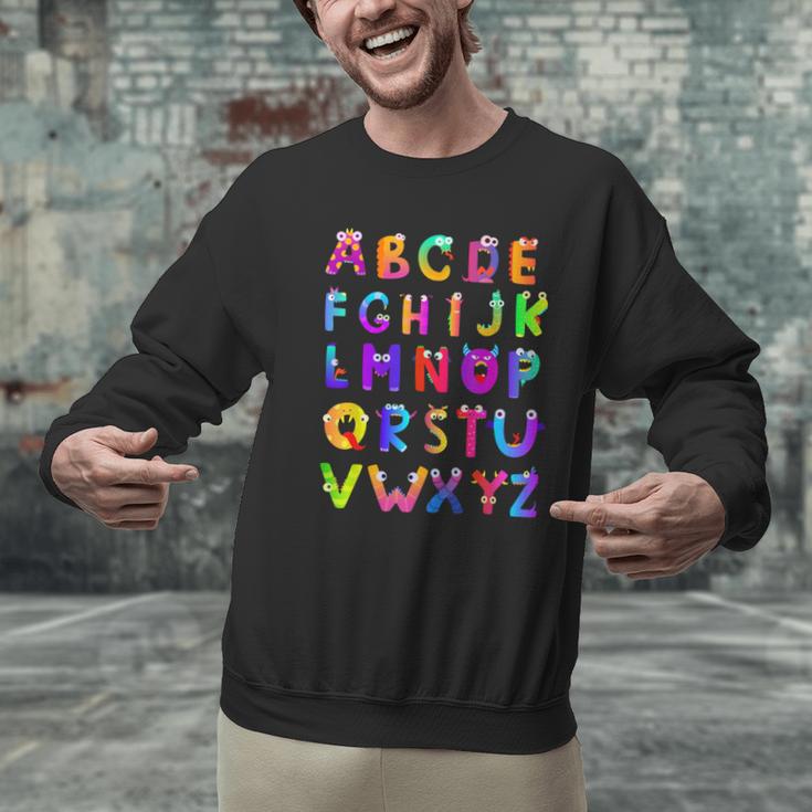 Monster ABC Cute Alphabet Halloween Teacher Costume Kids Men Graphic Sweatshirt, gift for family, gift for coworker Monster ABC Cute Alphabet Halloween Teacher Costume Kids Men Graphic Sweatshirt, gift for family, gift for coworker