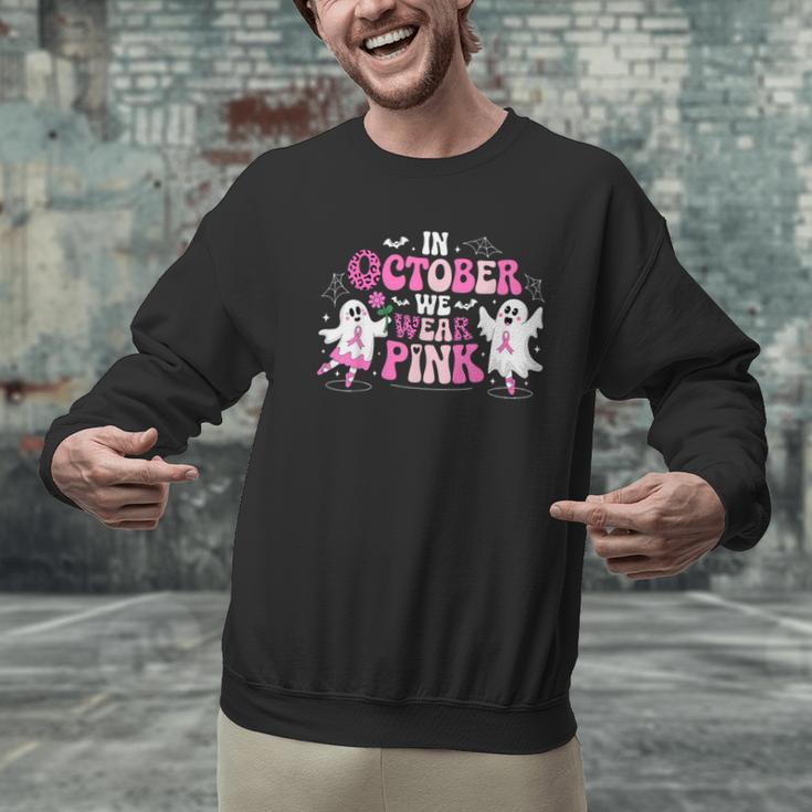 In October We Wear Pink Ballet Ghost Teacher Breast Cancer Men Graphic Sweatshirt, gift for family, gift for coworker In October We Wear Pink Ballet Ghost Teacher Breast Cancer Men Graphic Sweatshirt, gift for family, gift for coworker