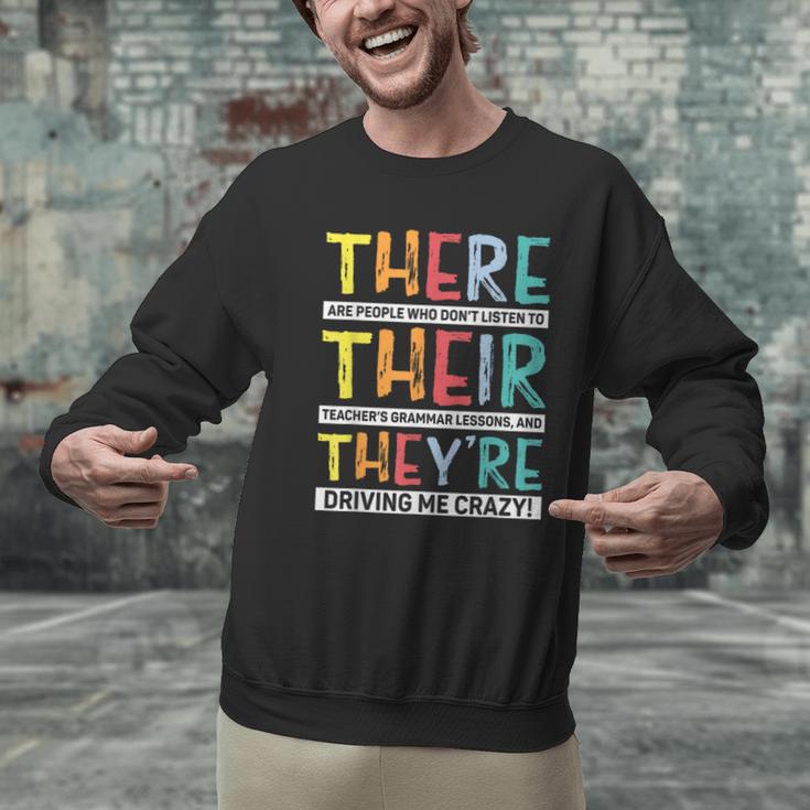 There Their They’Re Grammar Joke For English Teacher Student Men Graphic Sweatshirt, English Teacher Sweatshirts, gift for family, gift for coworker There Their They’Re Grammar Joke For English Teacher Student Men Graphic Sweatshirt, English Teacher Sweatshirts, gift for family, gift for coworker