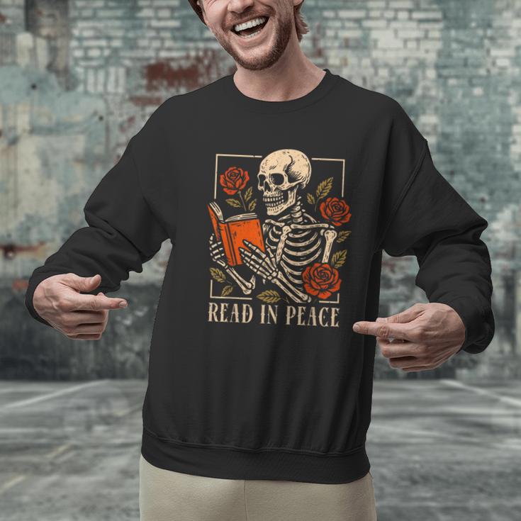 Read In Peace Skeleton Reading Book Halloween Teacher Men Graphic Sweatshirt, gift for family, gift for coworker