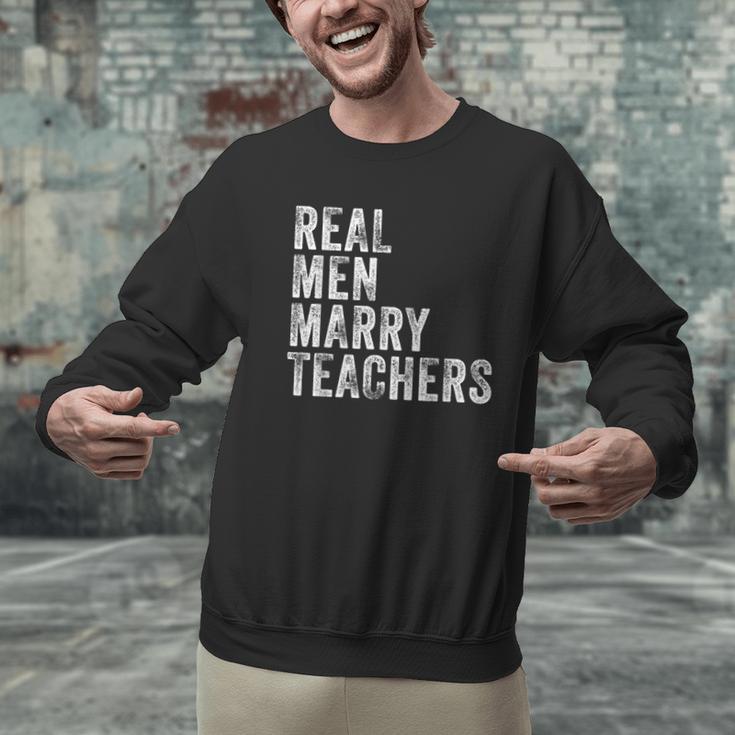 Real Men Marry Teachers Future Husband Wife Engagement Men Graphic Sweatshirt, gift for family, gift for coworker Real Men Marry Teachers Future Husband Wife Engagement Men Graphic Sweatshirt, gift for family, gift for coworker