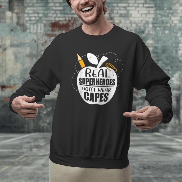 Real Superheroes Wear No Capes Teacher Design Teach Men Graphic Sweatshirt, gift for family, gift for coworker Real Superheroes Wear No Capes Teacher Design Teach Men Graphic Sweatshirt, gift for family, gift for coworker