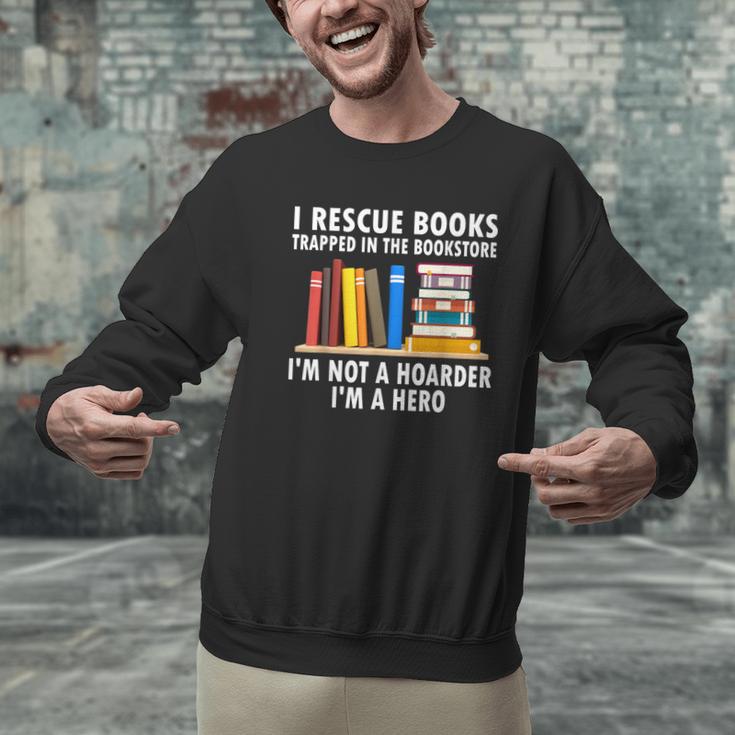 I Rescue Books Trapped In The Bookstore Book Teacher For Men Women Men Graphic Sweatshirt, gift for family, gift for coworker I Rescue Books Trapped In The Bookstore Book Teacher For Men Women Men Graphic Sweatshirt, gift for family, gift for coworker