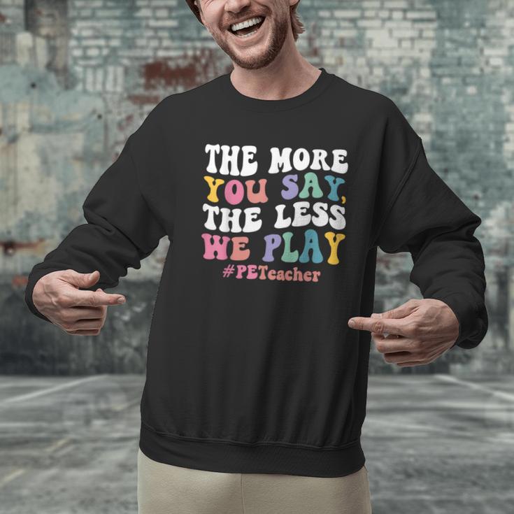 The More You Say The Less We Play PE Teacher Men Women Men Graphic Sweatshirt, Pe Teacher Sweatshirts, gift for family, gift for coworker The More You Say The Less We Play PE Teacher Men Women Men Graphic Sweatshirt, Pe Teacher Sweatshirts, gift for family, gift for coworker