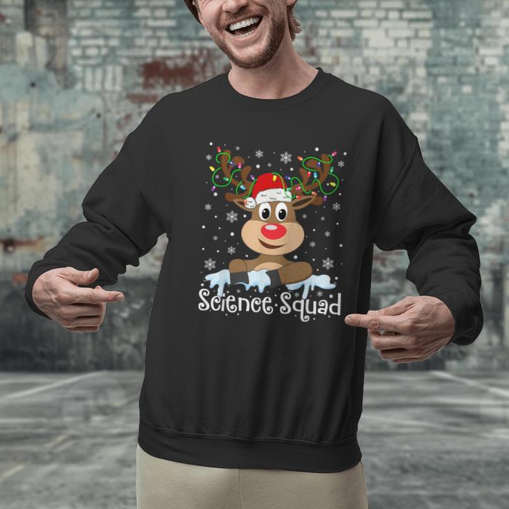 Science Teacher Squad Reindeer Christmas Teacher Xmas Lights For Men Women Men Graphic Sweatshirt, Science Teacher Sweatshirts, gift for family, gift for coworker Science Teacher Squad Reindeer Christmas Teacher Xmas Lights For Men Women Men Graphic Sweatshirt, Science Teacher Sweatshirts, gift for family, gift for coworker