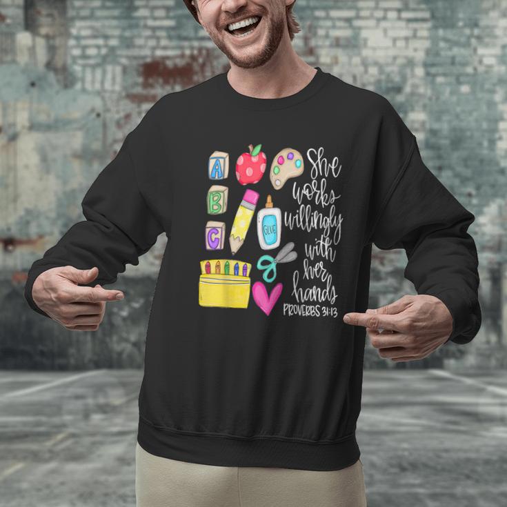 She Works Willingly With Her Hands Proverbs Daycare Teacher Men Women Men Graphic Sweatshirt, gift for family, gift for coworker She Works Willingly With Her Hands Proverbs Daycare Teacher Men Women Men Graphic Sweatshirt, gift for family, gift for coworker