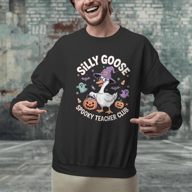 Silly Goose Spooky Teacher Club Halloween Witch Ghost Men Graphic Sweatshirt, gift for family, gift for coworker Silly Goose Spooky Teacher Club Halloween Witch Ghost Men Graphic Sweatshirt, gift for family, gift for coworker