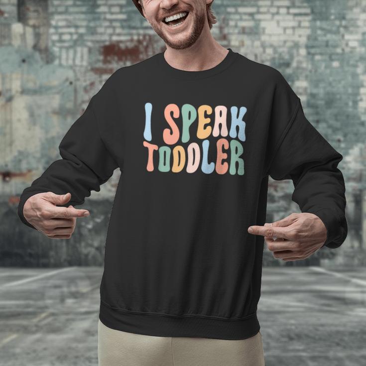 I Speak Toddler Teacher Pre School Back To School First Day Men Graphic Sweatshirt, gift for family, gift for coworker I Speak Toddler Teacher Pre School Back To School First Day Men Graphic Sweatshirt, gift for family, gift for coworker