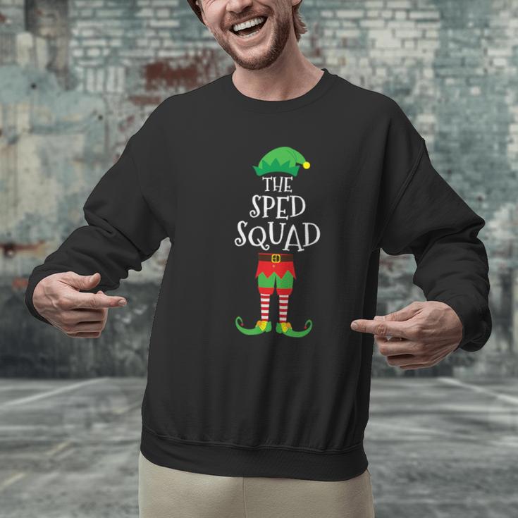 SPED Squad Elf Teacher Matching Christmas Party Pajama Men Graphic Sweatshirt, gift for family, gift for coworker SPED Squad Elf Teacher Matching Christmas Party Pajama Men Graphic Sweatshirt, gift for family, gift for coworker