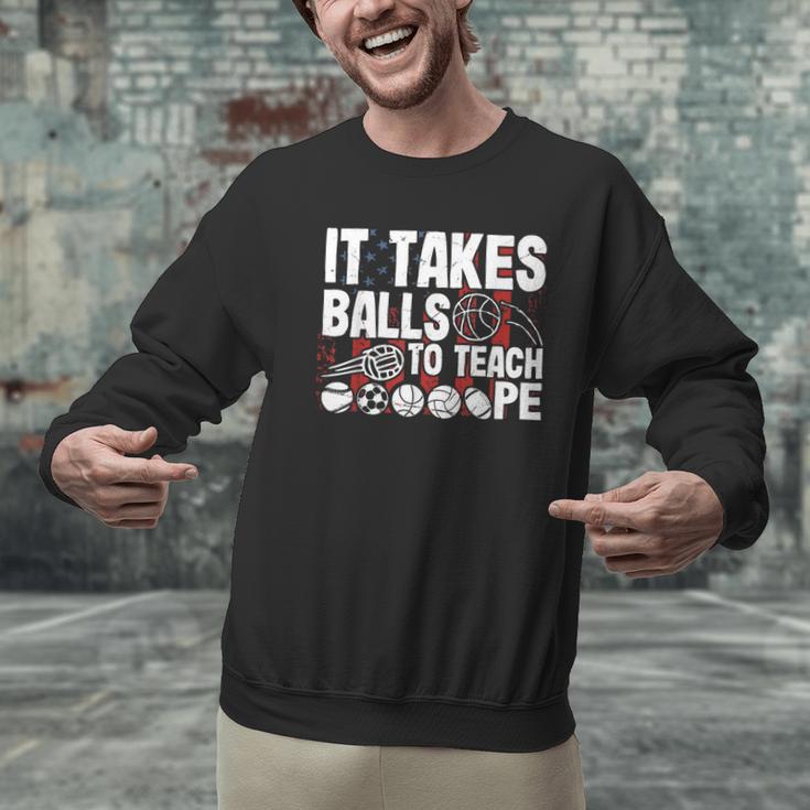 It Takes Balls To Teach Pe Teacher Chaos Coordinator US Flag Men Graphic Sweatshirt, Pe Teacher Sweatshirts, gift for family, gift for coworker It Takes Balls To Teach Pe Teacher Chaos Coordinator US Flag Men Graphic Sweatshirt, Pe Teacher Sweatshirts, gift for family, gift for coworker