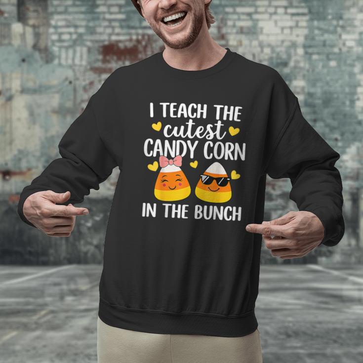 I Teach The Cutest Candy Corn In The Bunch Teacher Halloween Men Graphic Sweatshirt, gift for family, gift for coworker I Teach The Cutest Candy Corn In The Bunch Teacher Halloween Men Graphic Sweatshirt, gift for family, gift for coworker